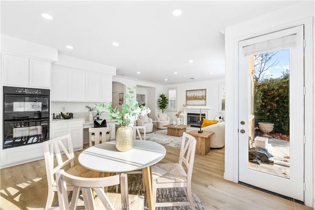 dining room featuring light hardwood / wood-style flooring