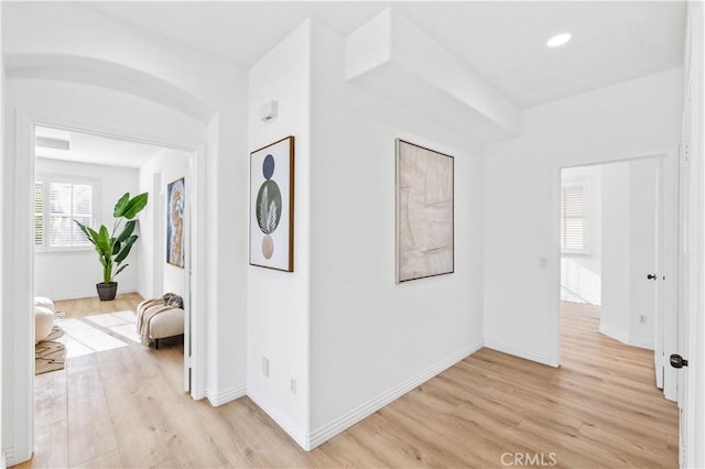 corridor featuring light hardwood / wood-style flooring