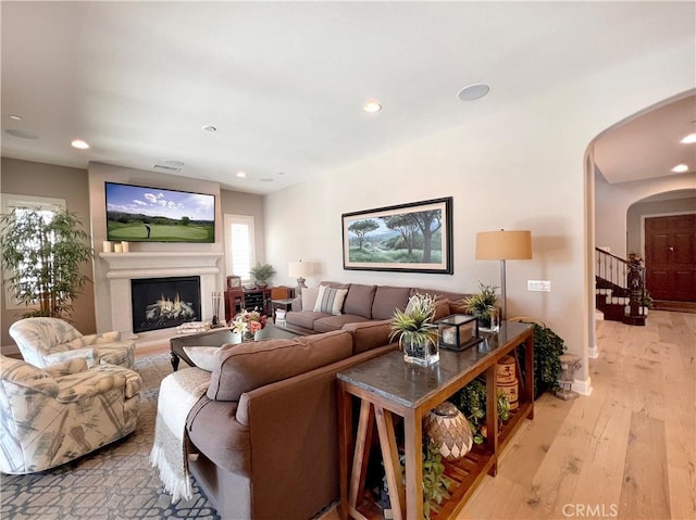 living room with light hardwood / wood-style floors