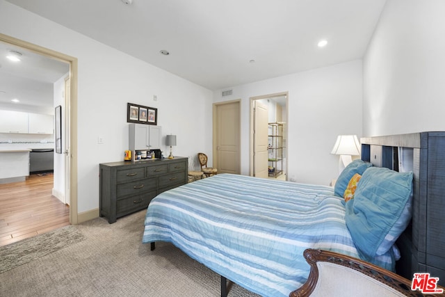 bedroom featuring light hardwood / wood-style flooring