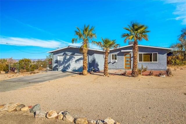 view of front of home featuring a garage