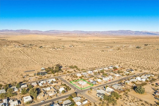 bird's eye view with a mountain view