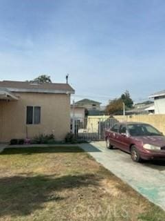 view of home's exterior featuring a yard