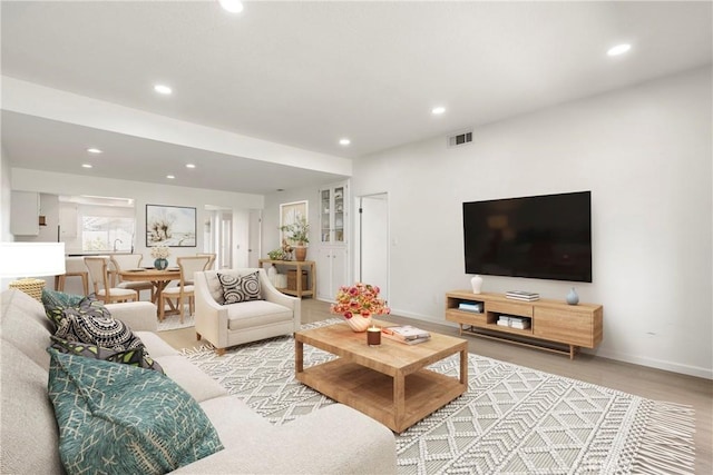 living room featuring light hardwood / wood-style floors