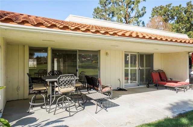 back of house with a patio area