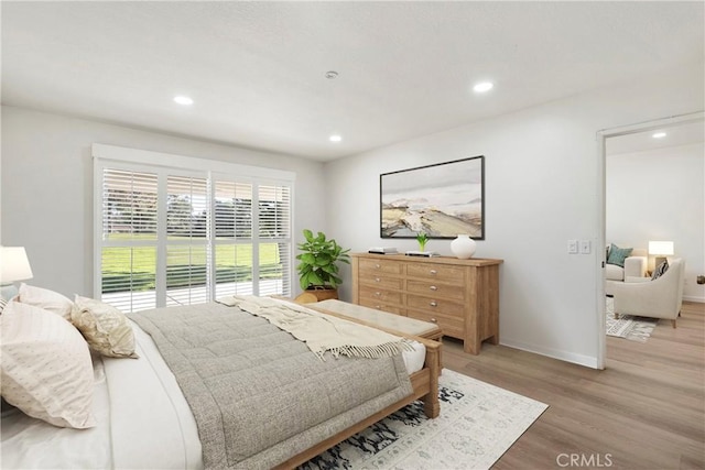 bedroom with wood-type flooring