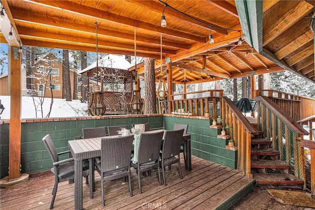 view of snow covered deck