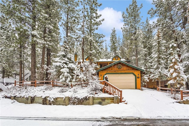 view of front of property with a garage