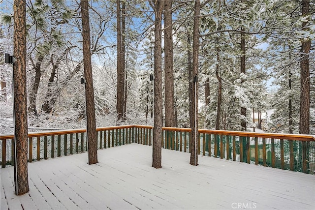 view of snow covered deck