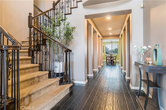 interior space featuring hardwood / wood-style flooring and ceiling fan