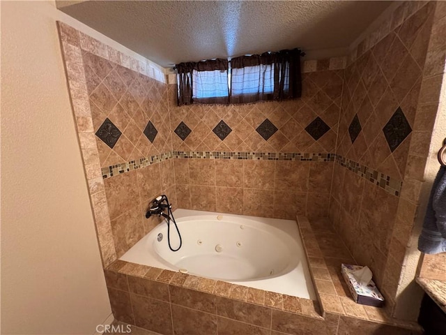 bathroom featuring a textured ceiling and a relaxing tiled tub