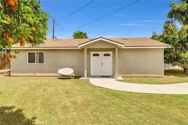 ranch-style house with a front yard