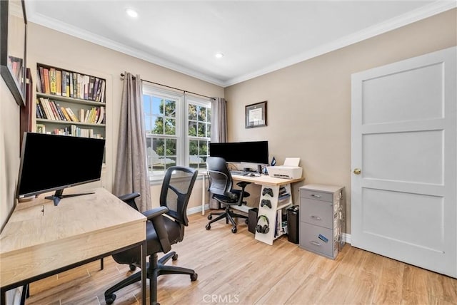 home office with light wood-type flooring and ornamental molding