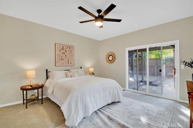 carpeted bedroom featuring access to exterior and ceiling fan