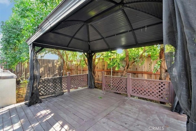 wooden deck with a gazebo