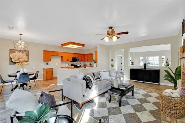 living room featuring ceiling fan