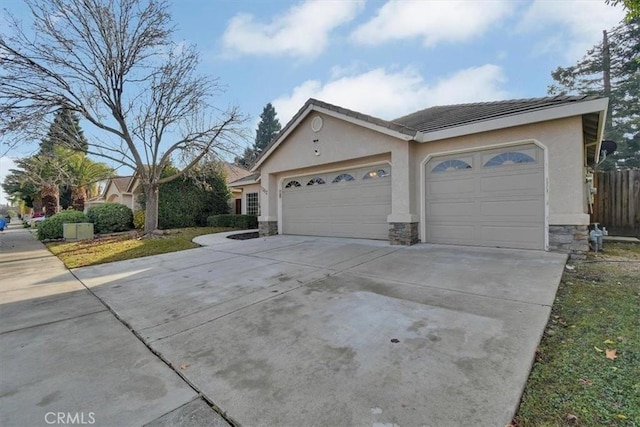 view of side of home with a garage