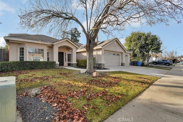 ranch-style home with a garage