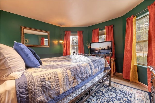 bedroom featuring hardwood / wood-style flooring