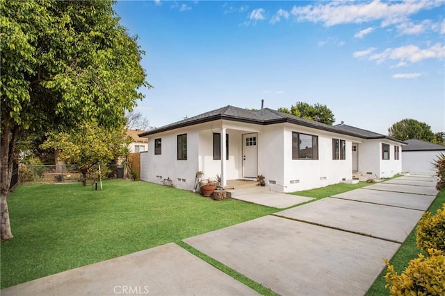 view of front of property with a front lawn