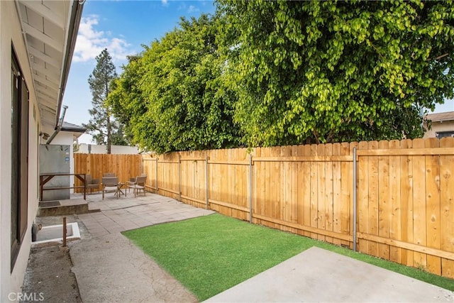 view of yard with a patio