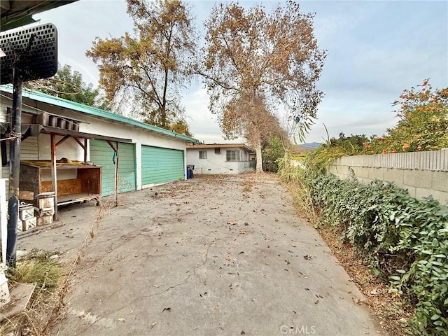 view of yard featuring a garage