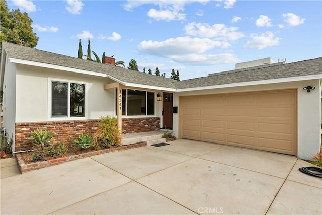 single story home with a garage