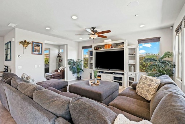 living room with ceiling fan