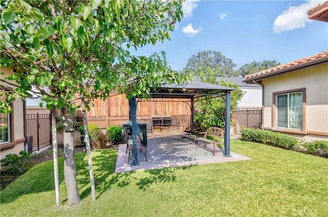 view of yard with a gazebo and a patio