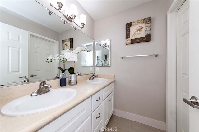 bathroom with tile patterned flooring and vanity