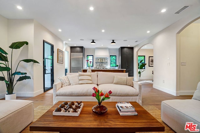 living room featuring light wood-type flooring