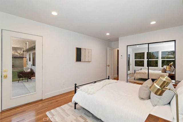 bedroom with light wood-type flooring