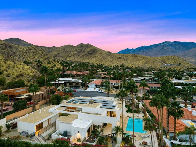 aerial view at dusk with a mountain view