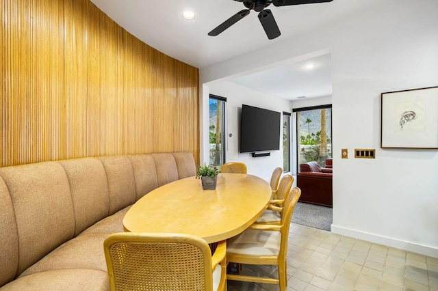 dining space featuring ceiling fan