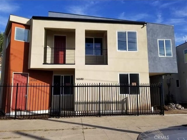 16582 Ainsworth, Gardena, CA 90247 - view of front facade with stucco siding and a fenced front yard