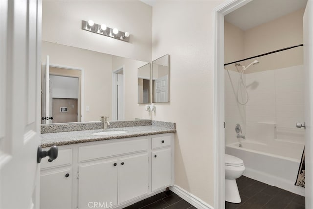 full bathroom featuring vanity, shower / bathtub combination, and toilet