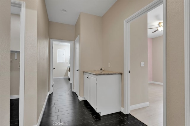 hall featuring dark hardwood / wood-style flooring