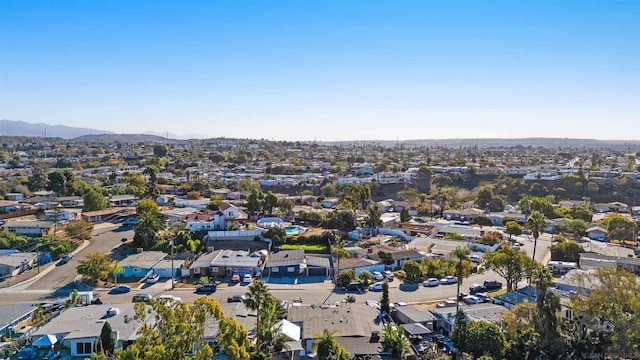 drone / aerial view featuring a mountain view