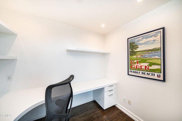 office space with dark wood-type flooring