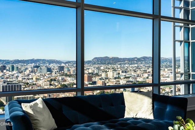 sunroom / solarium with a mountain view