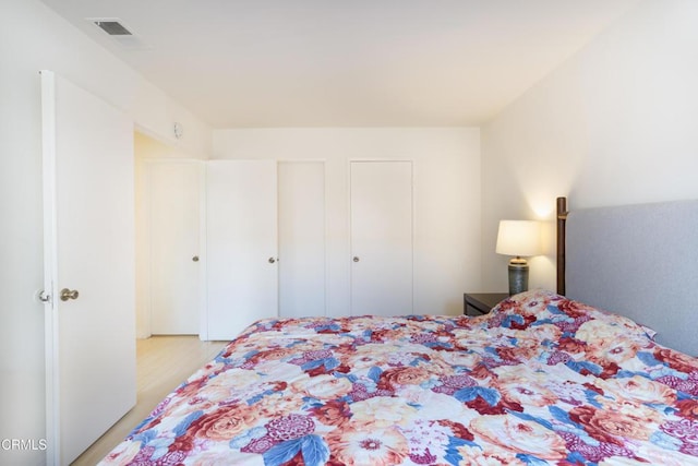 bedroom featuring light hardwood / wood-style floors