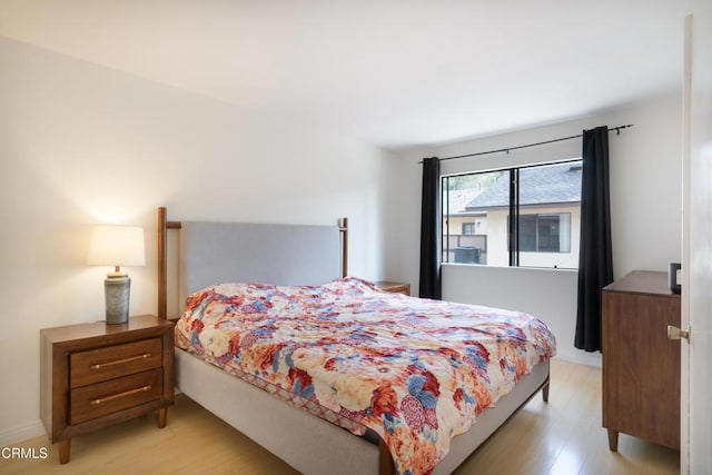 bedroom featuring light hardwood / wood-style floors