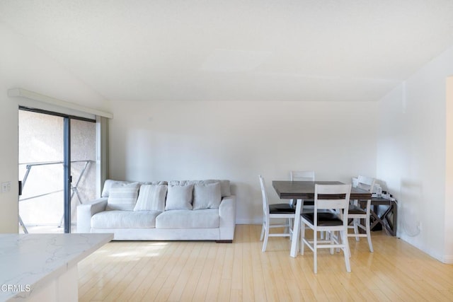 dining area with light wood-type flooring