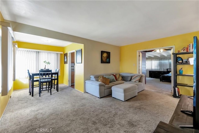 living room featuring light colored carpet