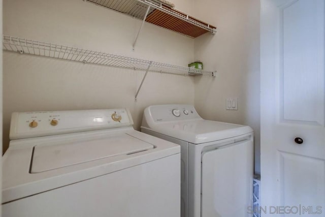 laundry area featuring independent washer and dryer