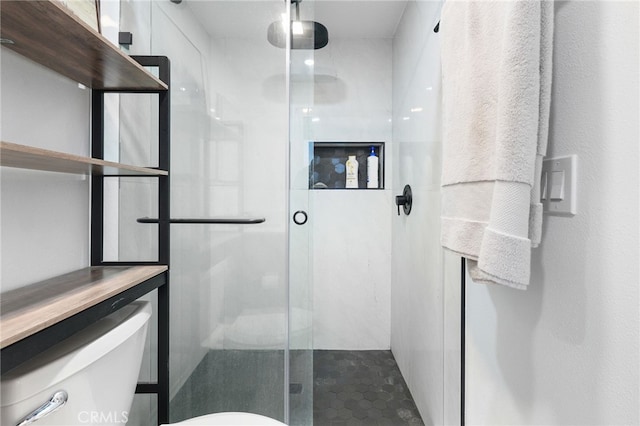 bathroom with walk in shower and toilet