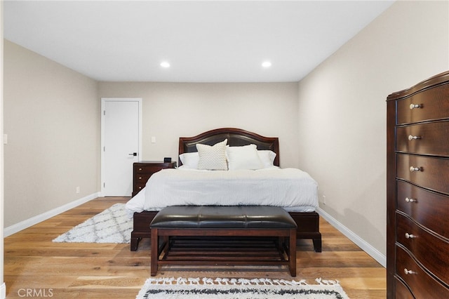 bedroom with light hardwood / wood-style flooring