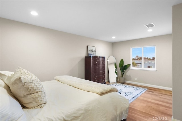 bedroom featuring hardwood / wood-style floors