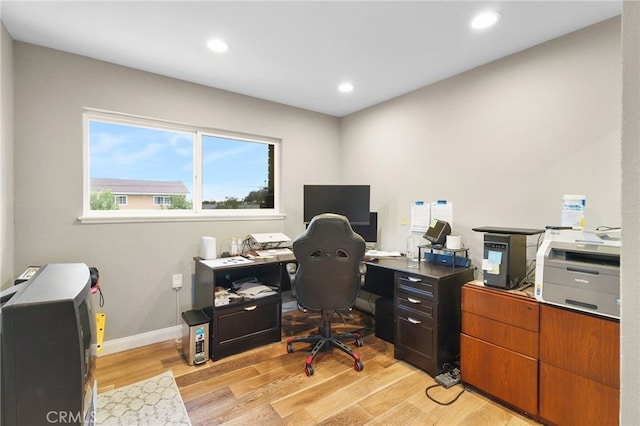 office area with light hardwood / wood-style flooring