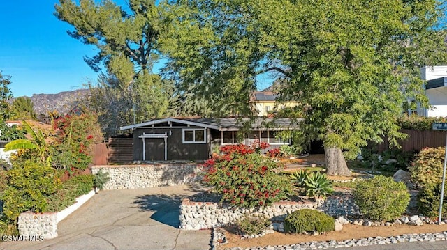 view of front of house featuring a mountain view